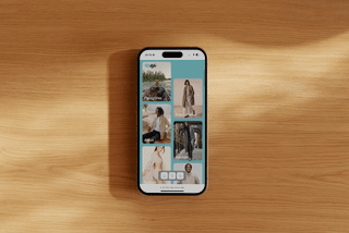 iphone mockup on wood showing the ecolife homepage