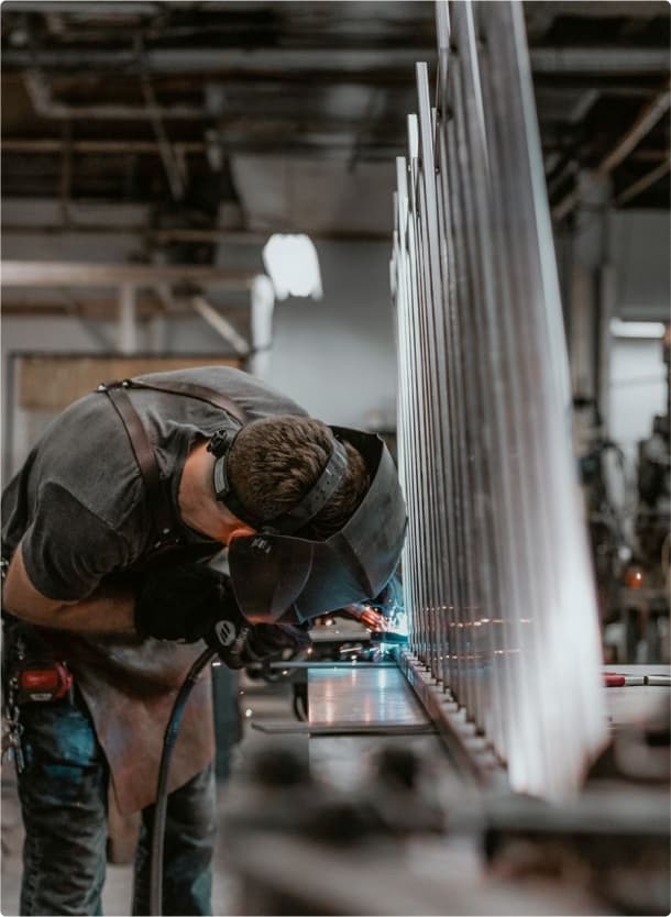 &why: Workist - Picture of a metalworker in the workshop