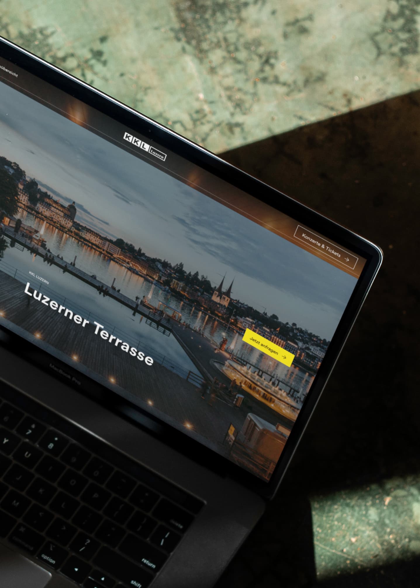 &why: KKL Luzern - Laptop showing the start page of the B2B site