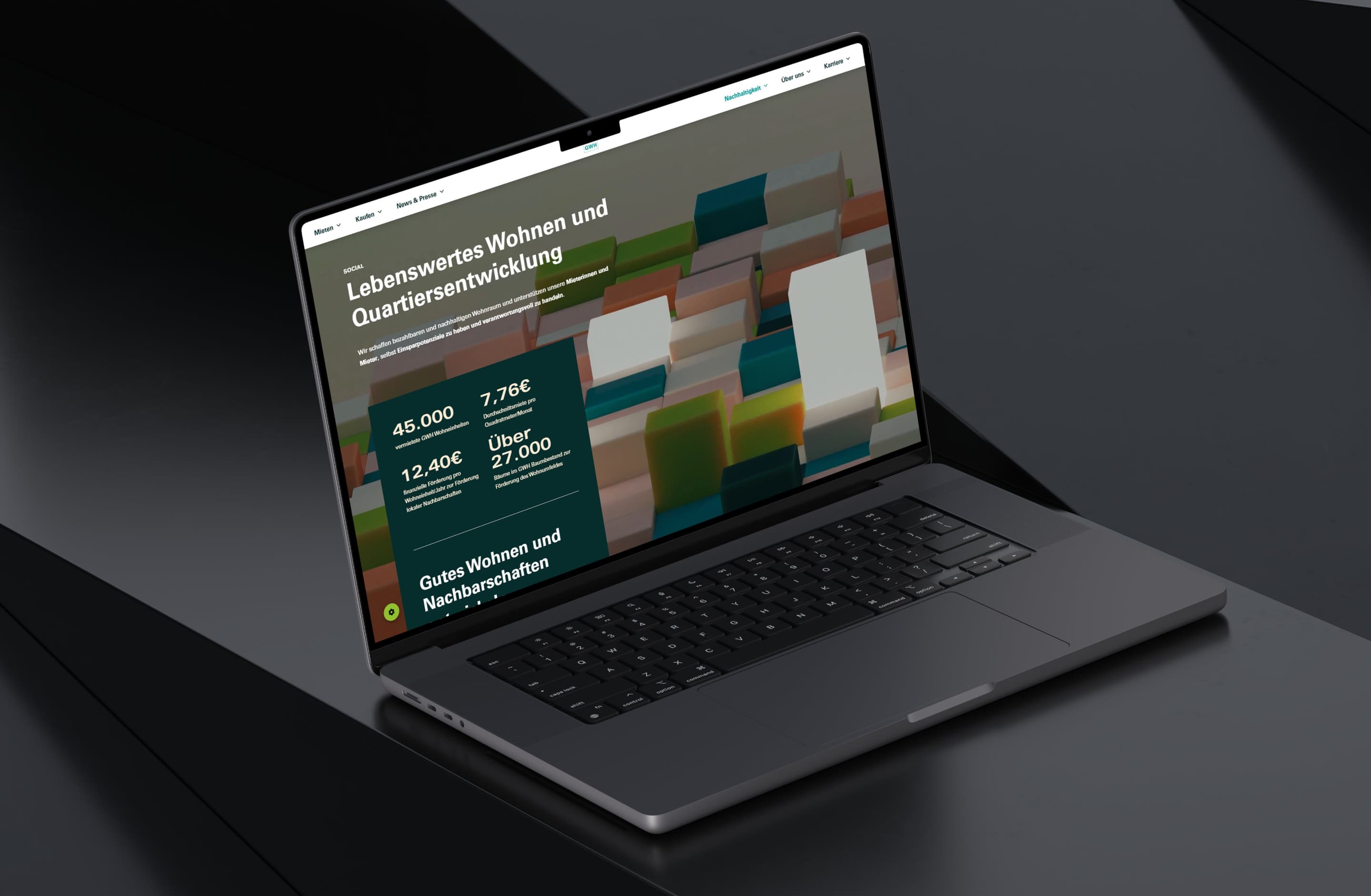 &why: GWH - open macbook with GWH website on it