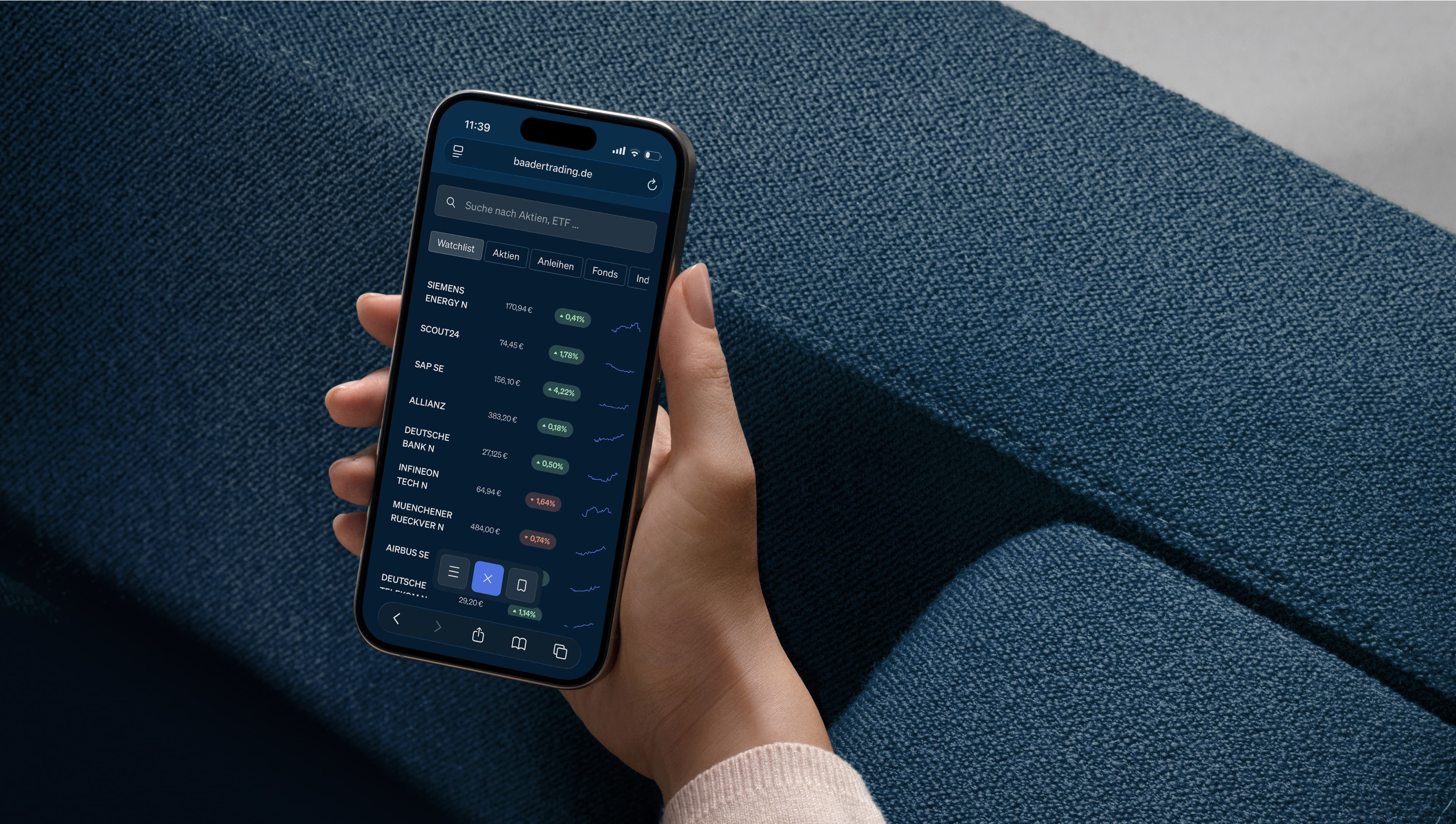 Baader Trading Watchlist on a Smartphone, Held by a hand